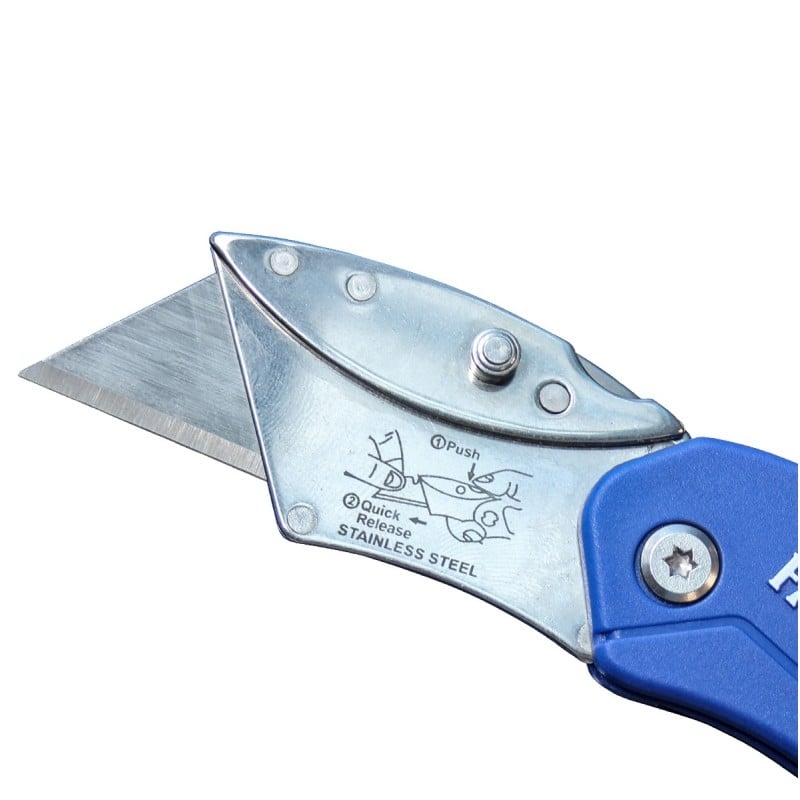 Close-up of an extended utility blade and metal blade holder beside a blue folding handle.