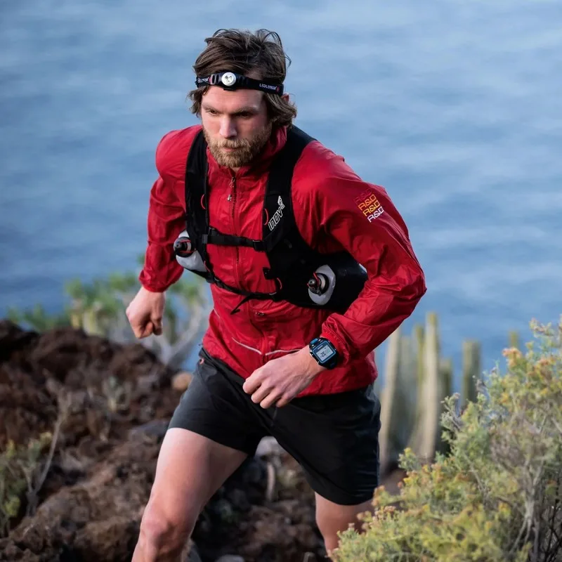 Runner wearing LED Lenser H3.2 head torch during an outdoor trail run